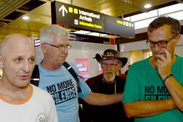 PHOTO: Abuse survivor Andrew Collins (left) with other surviros Phil Nagle, Gordon Hill and David Risdale (right) said more people will die unless a redress scheme is implemented. (AAP: Mal Fairclough)