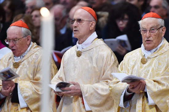 Cardinal Tarcisio Bertone (C) pictured in January 2016 at St Peter's basilica in Vatican. — AFP