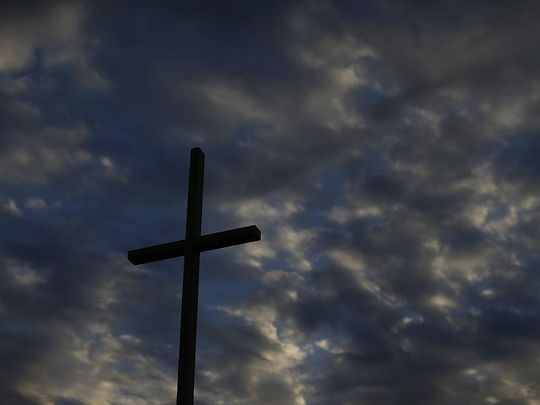 A cross against a colorful sky at Our Lady of Lourdes in De Pere on Wednesday, April 13, 2016. (Photo: Evan Siegle/USA TODAY NETWORK-Wisconsin)