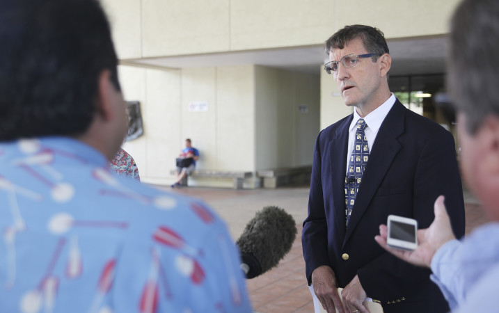 Attorney Mark Gallagher speaks at a news conference about three lawsuits he recently filed accusing Catholic priests in the Diocese of Honolulu of sexual abuse outside of Hawaii’s First Circuit Court, Wednesday, April 13, 2016, in Honolulu. The three suits allege the priests abused children and teens throughout the 1950s and 1960s. (AP Photo/Marina Riker)