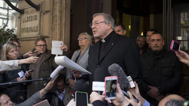 Cardinal Pell reads a statement after meeting victims of abuse in Rome last month. Photo: Getty Images