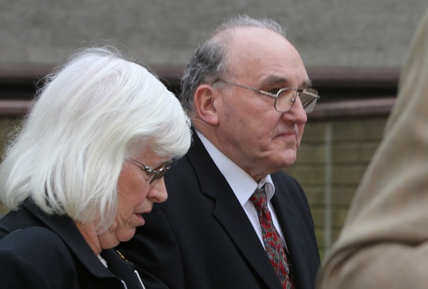 Curtis arriving at court with his wife