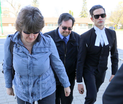 Fred King, center, follows an unidentified woman, left, and a member of his legal team into the courthouse on Tuesday, May 10, 2016 in Owen Sound, Ont. James Masters/The Owen Sound Sun Times/Postmedia Network
