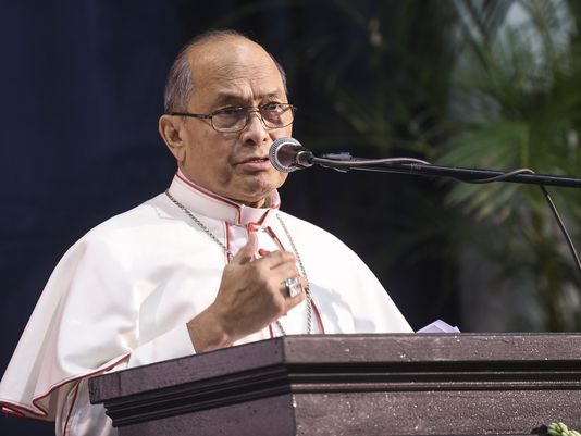 Archbishop Anthony Apuron speaks at the 2016 Academy of Our Lady of Guam Commencement Ceremony at the Phoenix Center on May 18, 2016.