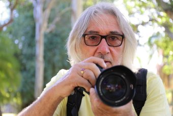 PHOTO: Richard 'Tommy' Campion credits photography with helping him move on after a childhood of abuse at the North Coast Children's Home in Lismore. (ABC North Coast: Samantha Turnbull)