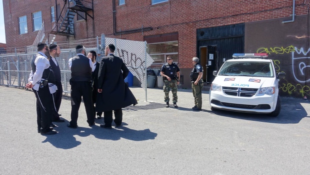 Montreal police assisted Batshaw Youth and Family Centres in a raid on a suspected illegal school in the Rosemont–La Petite-Patrie borough on Wednesday. (Simon-Marc Charron/Radio-Canada)