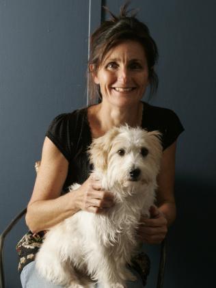 Journalist Joanne McCarthy pictured here with her dog Lloyd. PICTURE: NATALIE GRONO