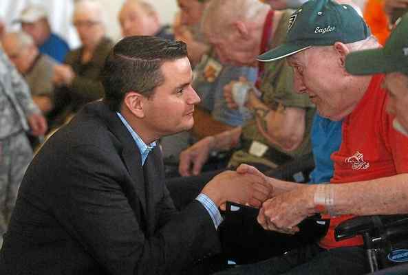 DIGITAL FIRST MEDIA FILE PHOTO State Rep. Nick Miccarelli, R-162, talks with Vietnam veteran Phillip McLaughlin during an event to honor military veterans at the Fair Acres Geriatric Center.