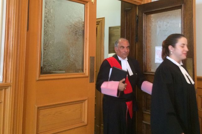 Justice Alphonsus Faour enters the courtroom on the final day of testimony in the Mount Cashel civil trial at Newfoundland Supreme Court. — Photo by Barb Sweet/The Telegram