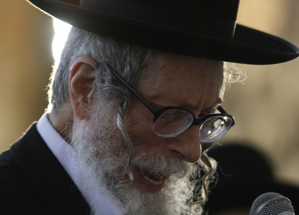 Rabbi Eliezer Berland, seen at a prayer service at the Western Wall on Jan. 25, 2012, fled to Morocco after being accused of sex abuse. (Uri Lenz/FLASH90)