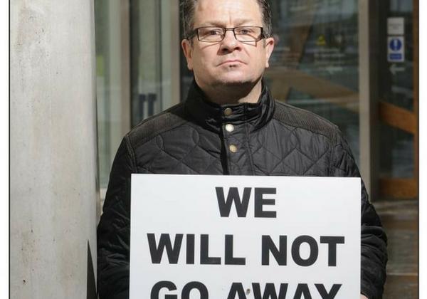 David Sharp who was a pupil at St Ninian's School in Falkland, Fife in the 1970s at the Scottish Parliament where he is highlighting the plight of the victims of historic sexual abuse.