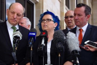 PHOTO: Child sex abuse survivor Kirsty Pratt, with Liberal MP Graham Jacobs (L) and Labor leader Mark McGowan. (ABC News: Andrew O'Connor)