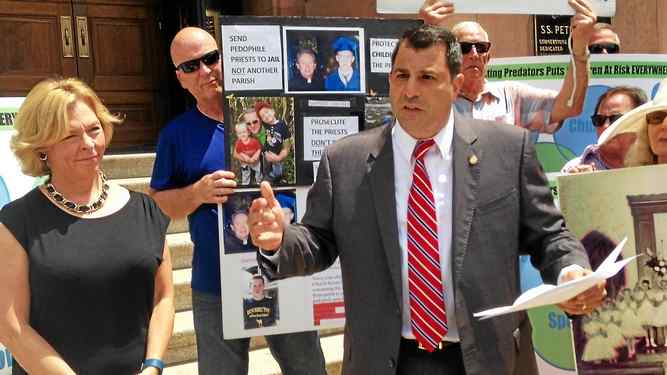 Rep. Mark Rozzi, D-Berks, speaks to protesters at rally for House Bill 1947 held in September outside the offices of the Archdiocese of Philadelphia. Rozzi says he will make another push to get the bill enacted into law in the new year. Digital First Media File Image