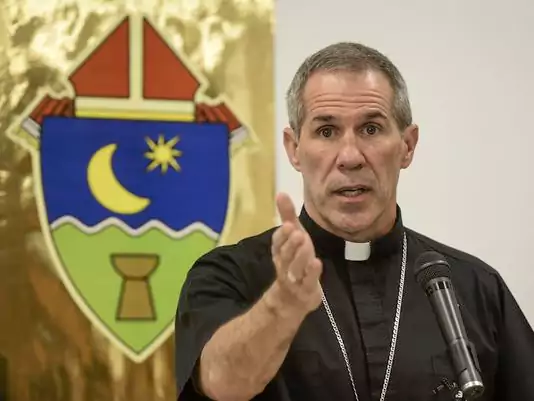 Archbishop Michael Jude Byrnes speaks during a press conference at the Archdiocese of Agana's chancery on Friday, Feb. 10, 2017. Byrnes announces the archdiocese's intention to voluntarily adhere to the provisions of the United States Catholic Conference of Bishop's Charter for the Protection of Children and Young People.