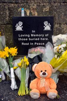 Tributes at the site where remains were discovered. Photo: Ray Ryan