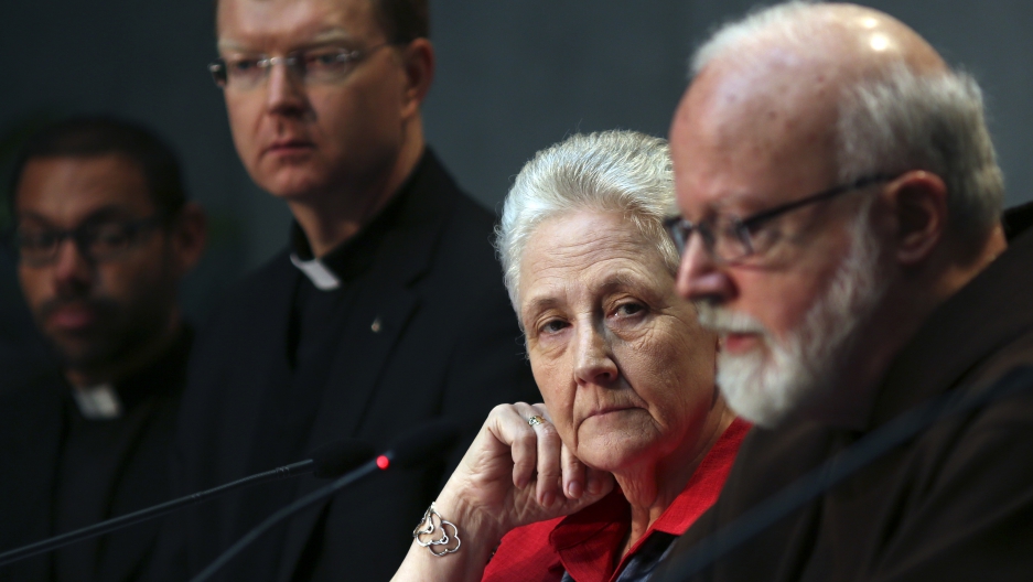 Marie Collins (2nd from right), who served as a memer of the Pontifical Commission for the Protection of Minors, watches as Cardinal Sean Patrick O'Malley (right) speaks during their briefing at the Holy See’s press office at the Vatican in Rome on May 3, 2014. Credit: Alessandro Bianchi/Reuters