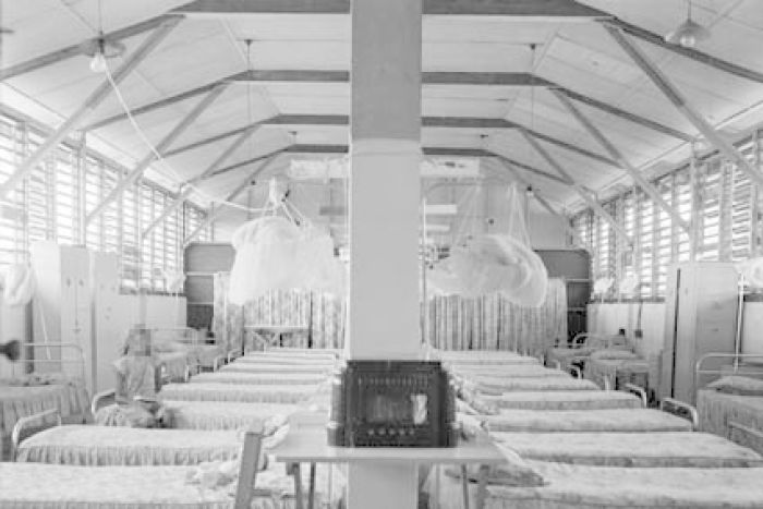 PHOTO: A dormitory in the Retta Dixon Home, a mission boarding school for Indigenous children in Darwin in 1958. (National Archives)