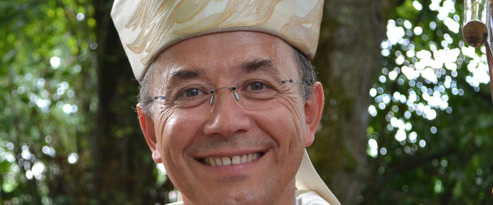 This photo dated Sept. 14, 2014 and provided by the Diocese des Landes shows French Bishop Herve Gaschignard posing for a photographer in Buglose, southern France. The French Catholic Church says that Monsignor Herve Gaschignard has resigned at the Vatican's suggestion because of accusations of an "inappropriate pastoral attitude." (Paul Perommat/Diocese des Landes via AP)