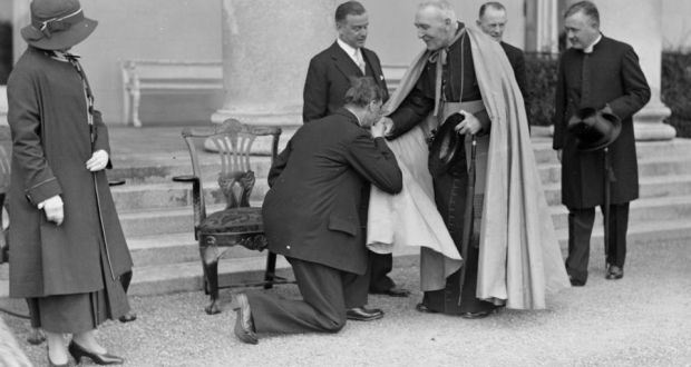 Eamon de Valera kisses the ring of the Archbishop of Dublin, Edward Joseph Byrne at the Vice Regal Lodge, Phoenix Park, Dublin, in 1933. Photograph: Keystone/Getty Images