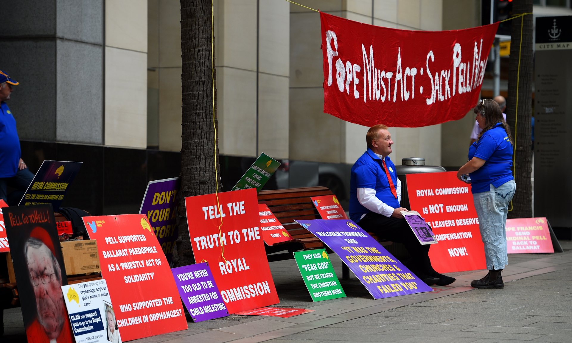 Protesters outside a royal commission hearing. Researchers have been looking at how to develop child-safe organisations so wide-scale abuse is not repeated.