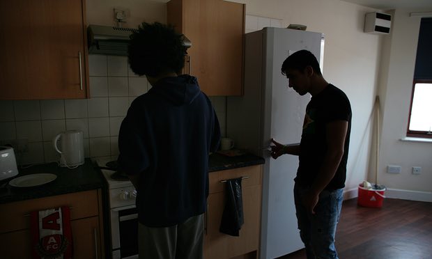 Two teenage boys in a children’s home. Residential care felt most safe when it was home-like, young people felt welcome and when adults looked out for them, young people in care said. Photograph: Martin Godwin for the Guardian