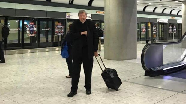 Cardinal Pell at London's Heathrow Airport. Photo: Zoie Jones