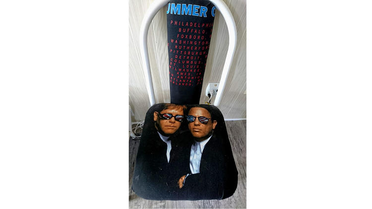 A chair Gemma Hoskins made from a concert t-shirt of Elton John and Billy Joel. (Amy Kaufman / Los Angeles Times)
