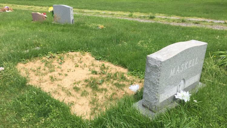 The grave site of Father Joseph Maskell shortly after his body was exhumed on Feb. 28, 2017. (John Benam)