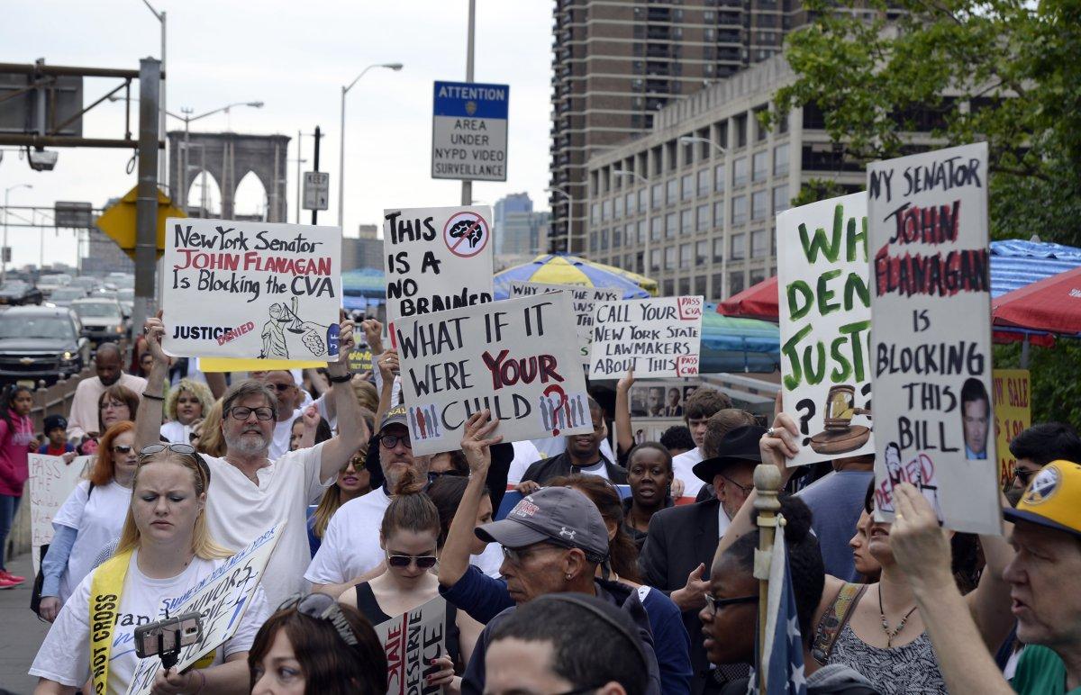 Almost 100 people march across the Brooklyn Bridge to tell Albany legislators to pass the Child Victims Act that would eliminate the statute of limitations on how long survivors can seek justice on June 4. (JEFFERSON SIEGEL/NEW YORK DAILY NEWS)