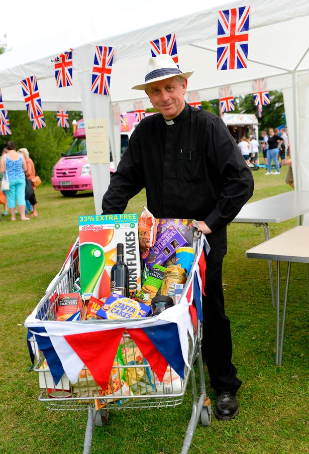 Rev Neale at the annual Hawley Fair, which he helped organise (Image: Surrey Advertiser)