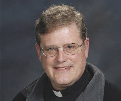 Father William Aitcheson volunteered to write a column disclosing his youth in the Klan and then take a leave after a reporter asked the diocese about his cross-burning past. (Diocese of Arlington, Va. via AP)