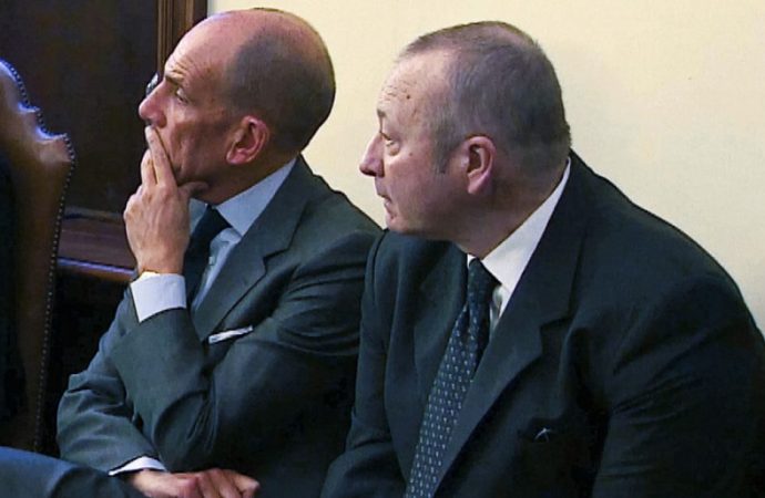 Defendants Giuseppe Profiti, left and Massimo Spina in a Vatican courtroom over charges of illictly spending $500,000 belonging to a papal pediatric hospital on remodeling the private apartment of a Vatican cardinal. (Credit: AP.)