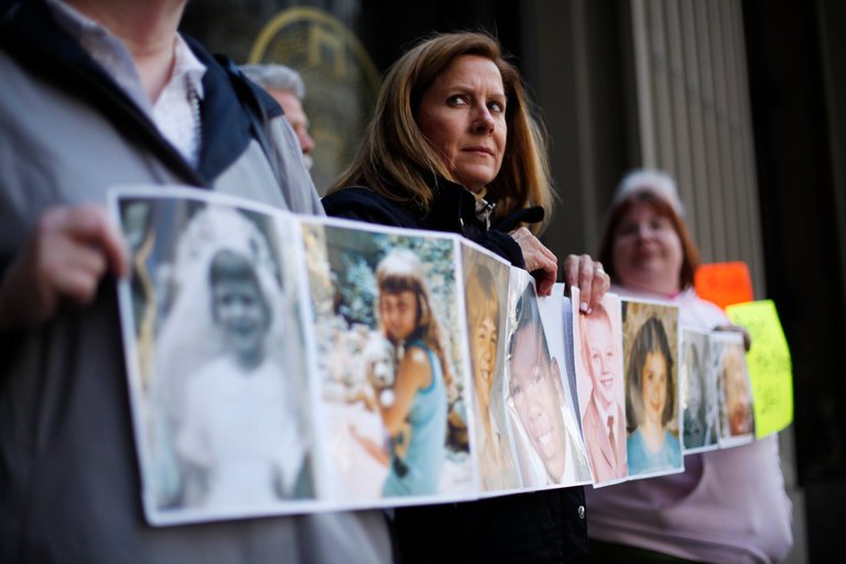 Barbara Blaine, president of Survivors Network of Those Abused by Priests, at a news conference in Philadelphia in 2011. Adults showed photographs of themselves as children, when they said they had been sexually abused by priests.