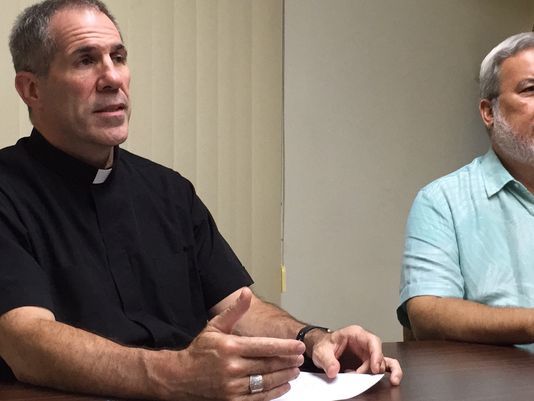 Archbishop Michael Jude Byrnes, left, talks about a complete revamp of the Archdiocese of Agana's sexual abuse policy, the safe environment program, and the independent review board policy, during a Tuesday afternoon news conference. Also in photo is the archdiocese's director of communications, Tony Diaz. The archdiocese faces nearly 140 clergy sex abuse lawsuits in local and federal court as of Oct. 24, 2017.
