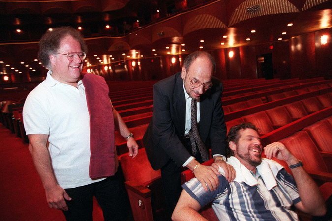 In 1995, Mr. Levine, left, and Joseph Volpe, center, general manager of the Met, waking the baritone Thomas Hampson, who was discovered catching a nap in the opera house.