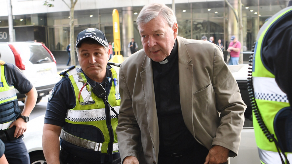 Cardinal Pell, accused of historic sex abuse, arrives at Melbourne Magistrates Court on Thursday. Photo: AAP