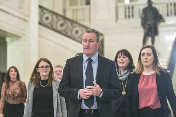 Sinn Fein's Conor Murphy arrives for a press conference in the Great Hall of Stormont in Belfast in January.