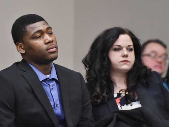 Former MSU football player Josh King sits with his attorney Shannon Smith, Wednesday, April 4, 2018, before appearing before Circuit Judge Rosemarie Aquilina. King and former teammates Demetric Vance and Donnie Corley were accused of sexually assaulting a female student during a party at a campus apartment in January 2017. All three pleaded guilty to lesser charges of seduction as part of an agreement with prosecutors. (Photo: Matthew Dae Smith/Lansing State )