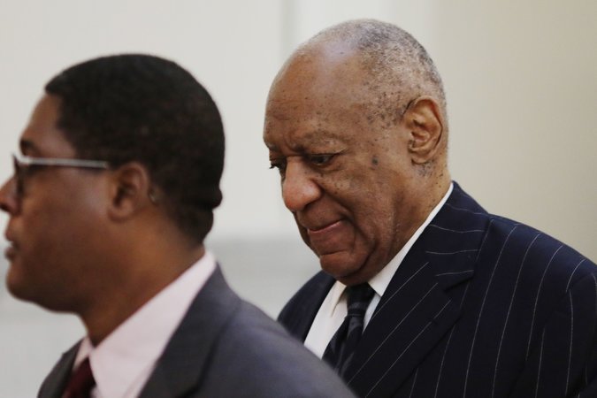 Mr. Cosby, right, arriving for the third day of his retrial at the Montgomery County Courthouse in Norristown, Pa.