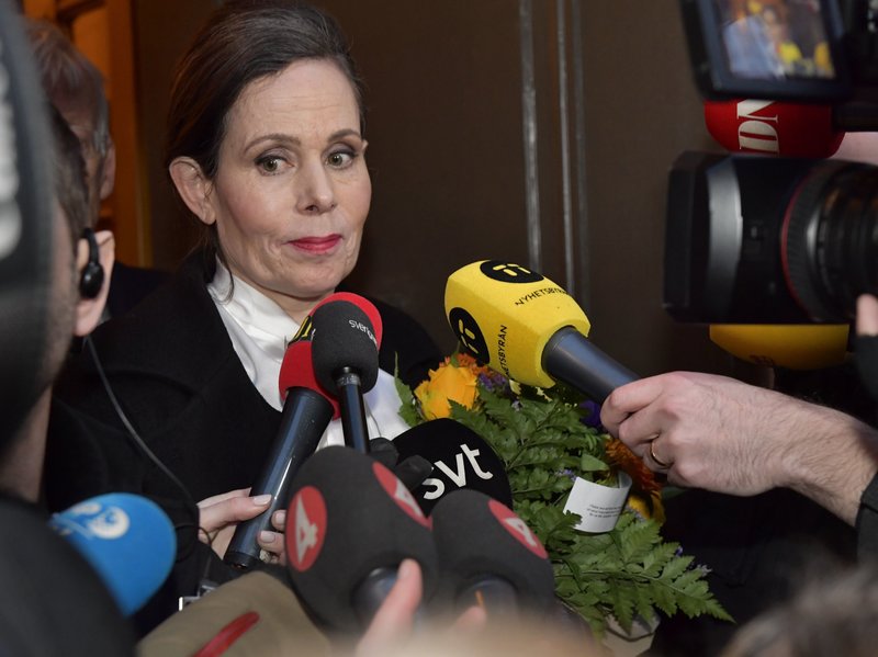 The Swedish Academy's Permanent Secretary Sara Danius talks to journalists as she leaves a meeting at the Swedish Academy in Stockholm, Sweden, on Thursday.