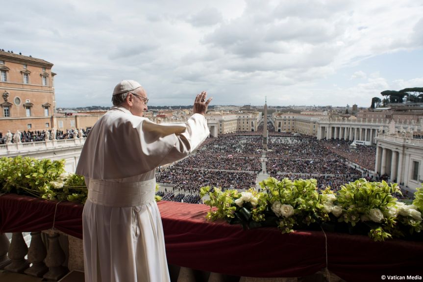 Pope Francis delivers the Urbi et Orbi (to the city and to the world) blessing at the end of the Easter Sunday Mass in St. Peter’s Square at the Vatican, Sunday, April 1, 2018. (Vatican Media via AP)