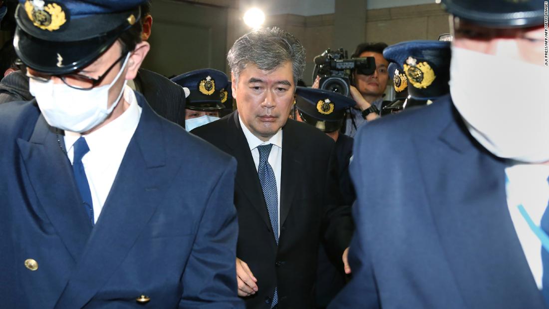 Japan's Administrative Vice Finance Minister Junichi Fukuda leaves the finance ministry in Tokyo amid allegations of sexual harassment.