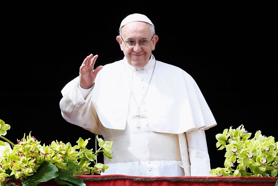 Pope Francis appears before delivering his Easter message in the Urbi et Orbi (to the city and the world) address from the balcony overlooking St. Peter's Square at the Vatican on April 1. (Stefano Rellandini/Reuters)