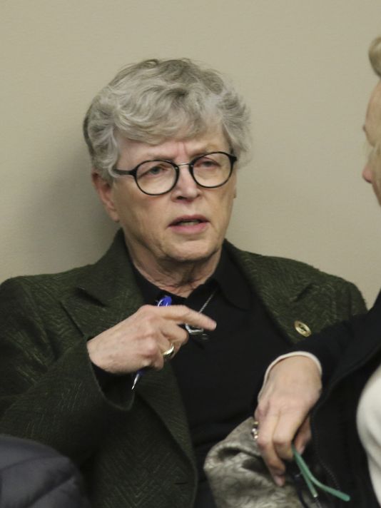 MSU President Lou Anna Simon arrives Wednesday afternoon, Jan. 17, 2018, in Circuit Judge Rosemarie Aquilina's courtroom during the second day of victim impact statements regarding former sports medicine doctor Larry Nassar, who pled guilty to seven counts of sexual assault in Ingham County, and three in Eaton County, Mich.