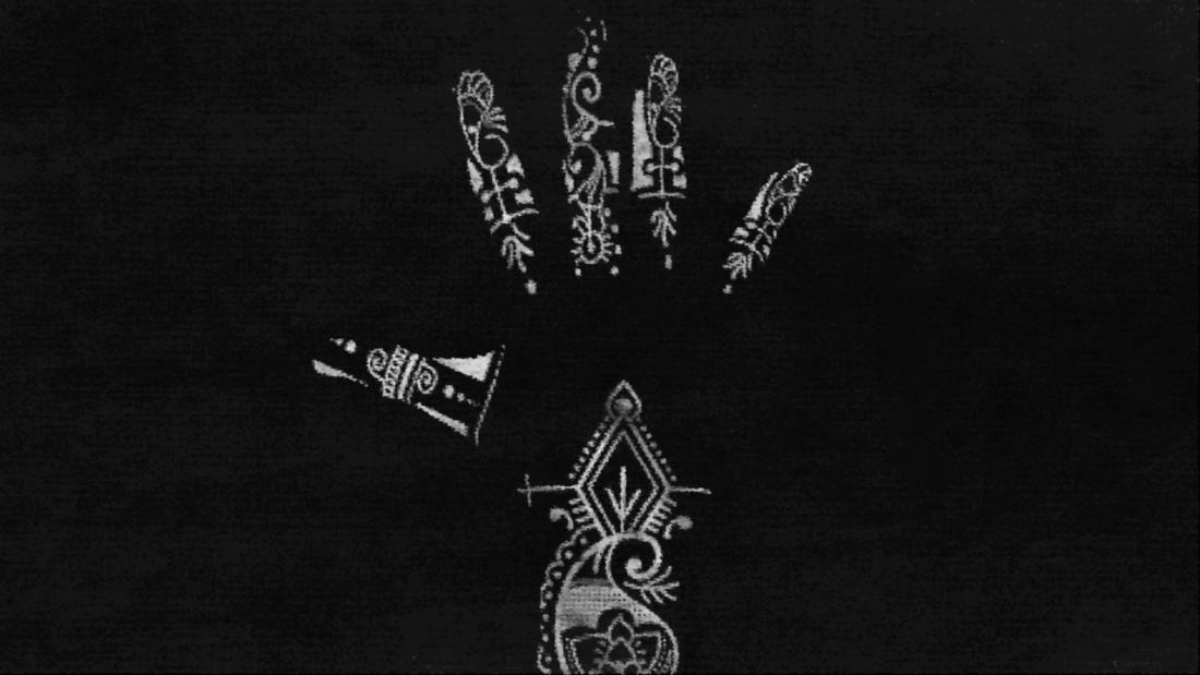 An illustration of a woman's hand with henna, a Sudanese wedding tradition.