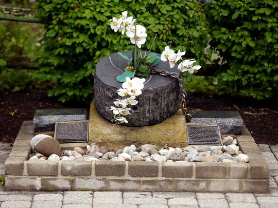 Bill Crain Jr., who says he was abused at Delbarton as a child, takes comfort in a small memorial to sex abuse victims that he built near the parking lot of his home parish in Mendham, where he was abused by another priest, the Rev. James Hanley, who was defrocked after admitting he molested at least a dozen children. (Photo: Bob Karp/Staff Photographer)