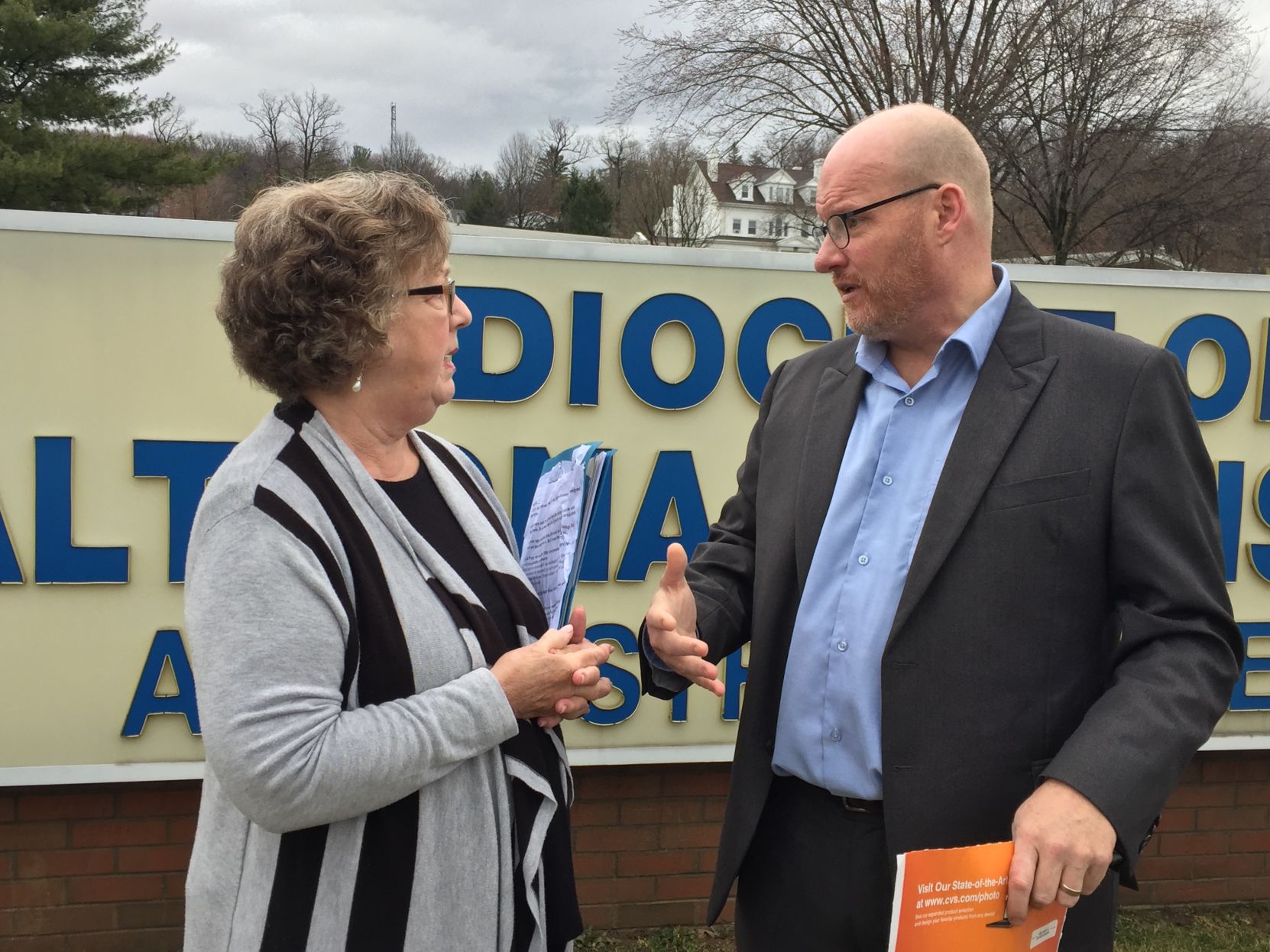 Judy Jones (left), Midwest associate director of the Survivors Network of those Abused by Priests, and Shaun Dougherty, a reported victim of child sexual abuse, participate in an event outside the Roman Catholic Diocese of Altoona-Johnstown headquarters in Hollidaysburg, Blair County, on Wednesday, March 1, 2017.