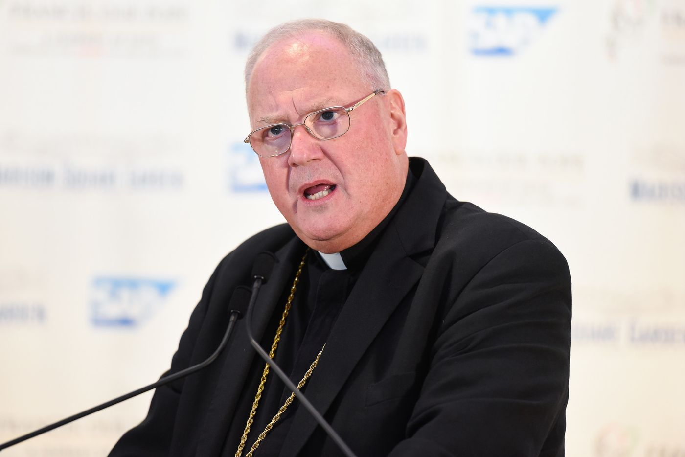 Timothy Cardinal Dolan met with state Senate President John Flanagan in the days before the vote on the governor’s budget. (Matthew Eisman / Getty Images)