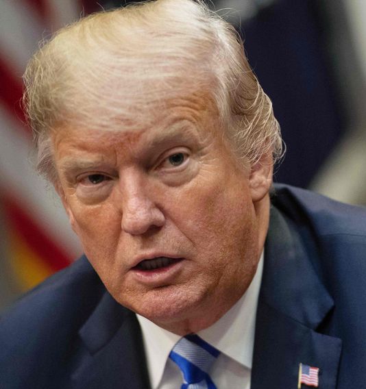 President Donald Trump speaks to the press before a meeting with Republican lawmakers at the White House.