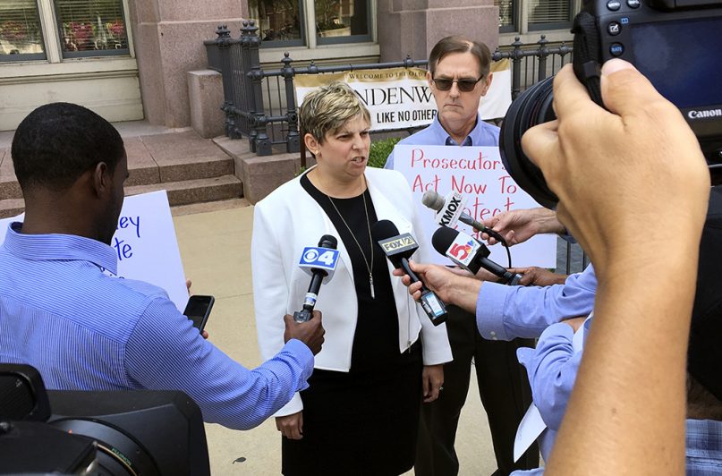 Attorney Nicole Gorovsky speaks to reporters in St. Louis on Aug. 22, 2018, with clergy sex abuse advocate and victim David Clohessy by her side. (AP Photo/Jim Salter)